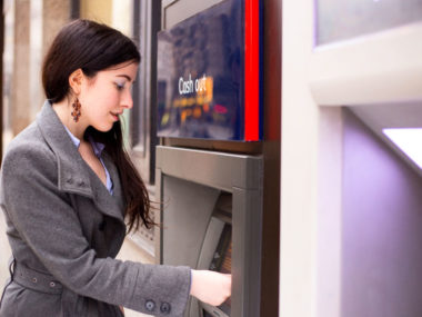 woman using ATM